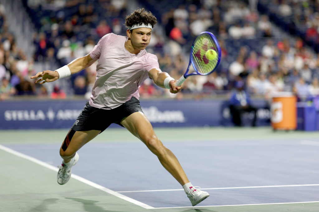 Ben Shelton lunges for a ball while playing Taylor Fritz at the 2025 ATP Masters 1000 National Bank Open