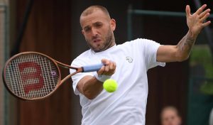 Pictured: Dan Evans hitting a forehand